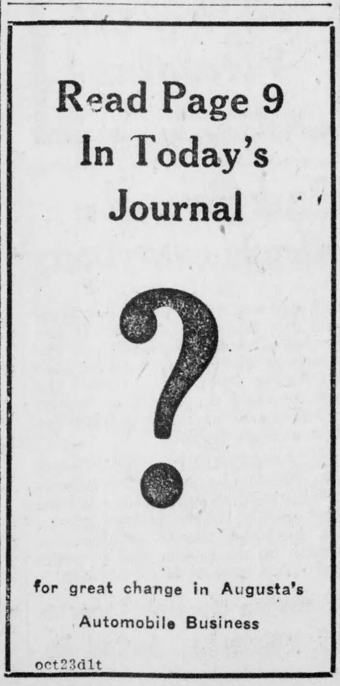 Boxed advertisement with a large question mark in the center, headed by three lines of text referring readers to a [unclear word] in a newspaper, with a two-line caption below about a change in a local [unclear word].